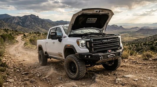 Duramax HD pickup truck in off-road setting showcasing Duramax delete kit performance