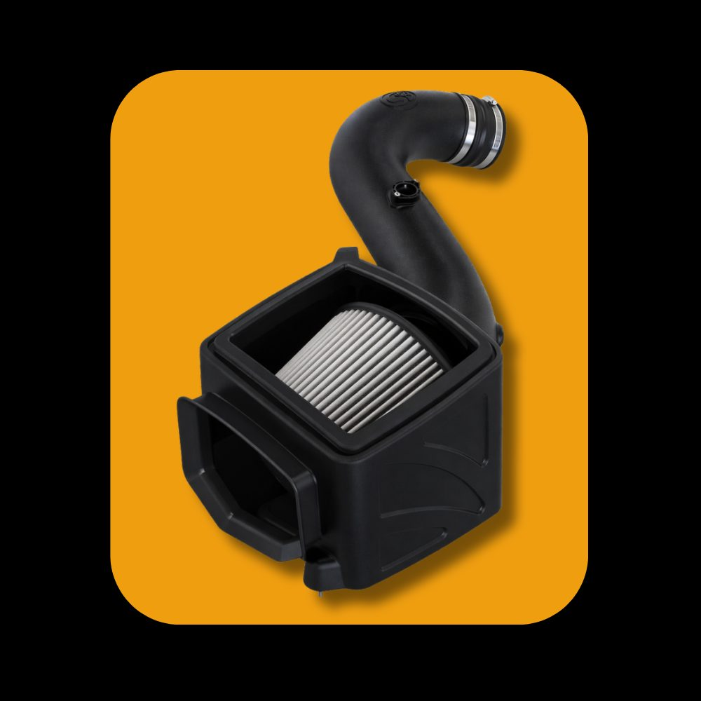 S&B cold air intake system installed on GM Duramax diesel engine, showing intake components and routing.
